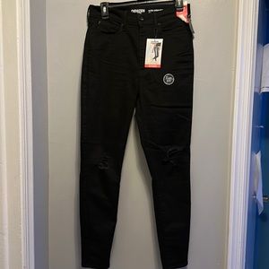 New denizen Levi’s black ripped at knee ultra high rise ankle jegging.